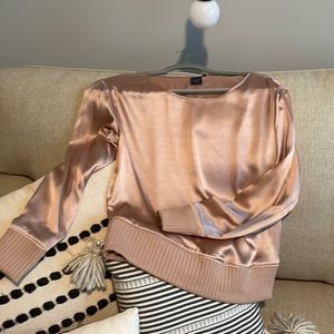 Beautiful blush blouse with wrist and waistband detail